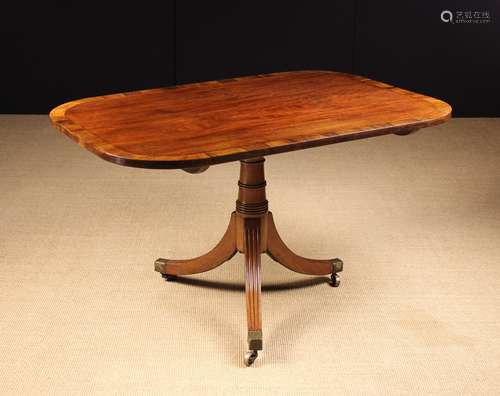 A Regency Mahogany Tilt-top Tripod Breakfast Table.