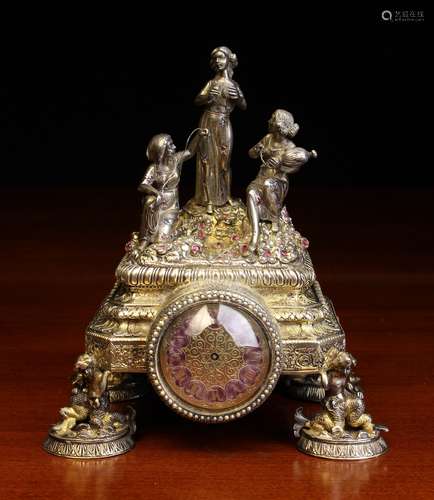 A 19th Century Viennese Silver Gilt Boudoir Clock in an elab...