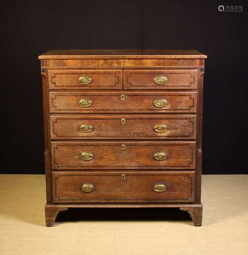 A Large Georgian Inlaid Oak Chest of Drawers.