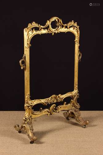 A Large Victorian Carved Giltwood Fire-screen (void screen p...