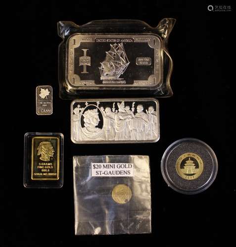 A Small Group of Silver & Gold Collectables: A 2005 ½ oz 999...