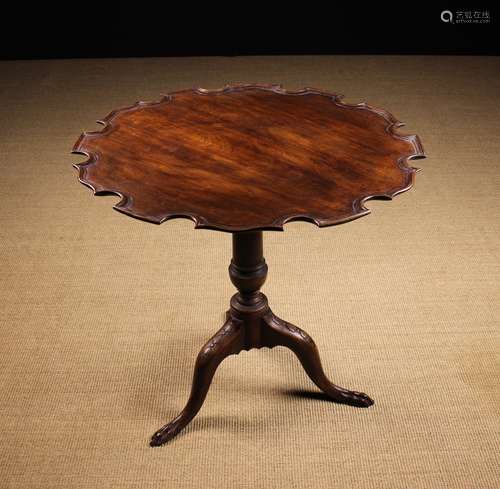 A Georgian Mahogany Tilt-top Tripod Table.