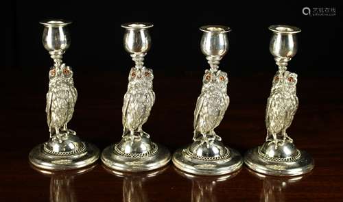 A Set of Four Fine Silver Plated Owl Candlesticks by Roberts...