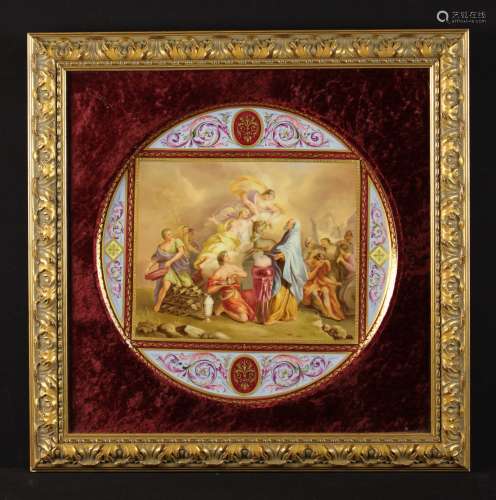 A Vienna Porcelain Plaque mounted in a carved giltwood frame...
