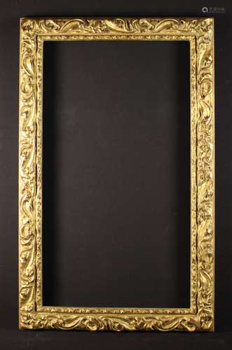 A 19th Century Italianate Giltwood Frame carved with swirls ...