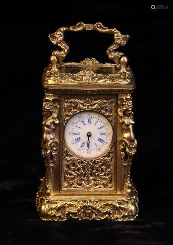 A Vintage Miniature Carriage Clock set in a gilt metal case ...