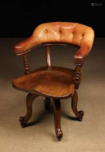 A Victorian Mahogany Swivel Chair.