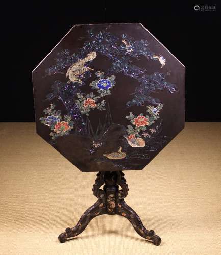 A Black Lacquered Mother-of-pearl Inlaid Tilt-top Tripod Tab...