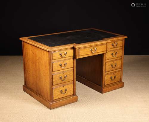 An Oak Pedestal Desk.