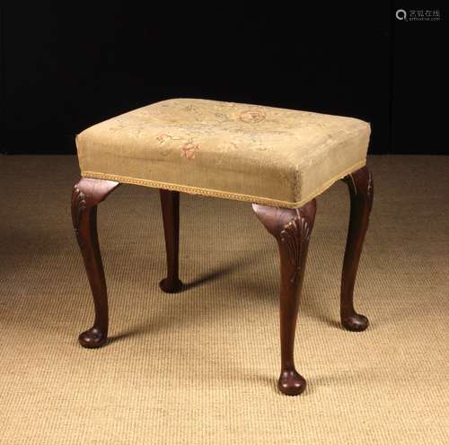 A 19th Century George I Style Carved Mahogany Stool.