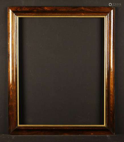 A 19th Century Moulded Rosewood Picture Frame with gilt slip...