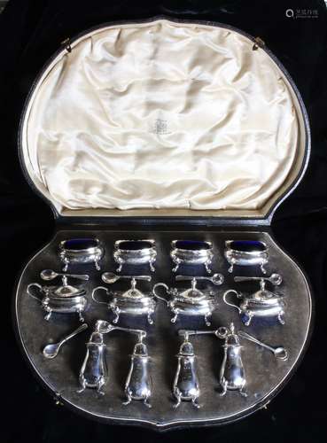 A Fine Cased Twelve-piece Silver Condiment Set comprising of...