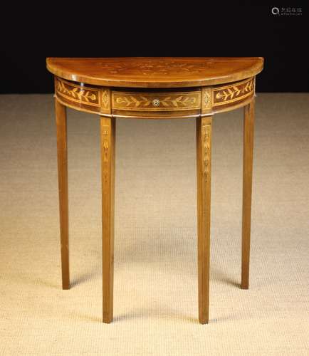 A Small Demi-lune Marquetry Side Table in the style of Edwar...