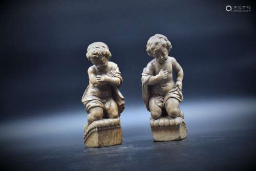 Couple d’ angelots en bois sculpté XVIIIème. Manque les aile...