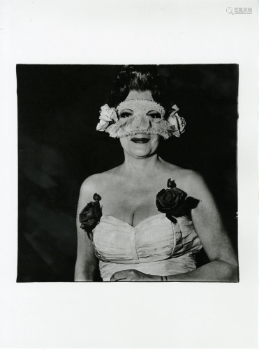 DIANE ARBUS - Lady at a Masked Ball with Two Roses on