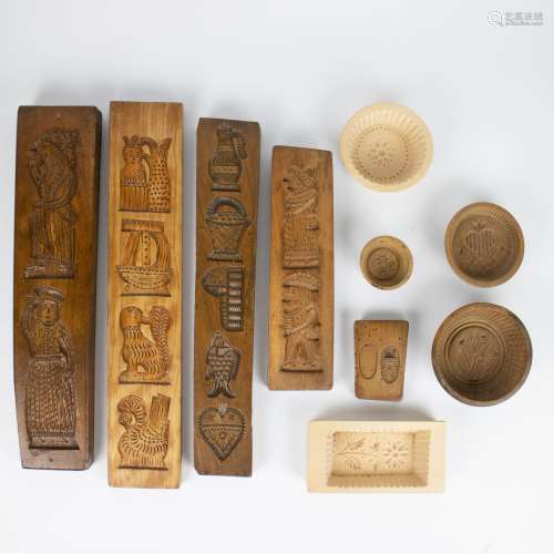 A collection of wooden gingerbread & cookie moulds