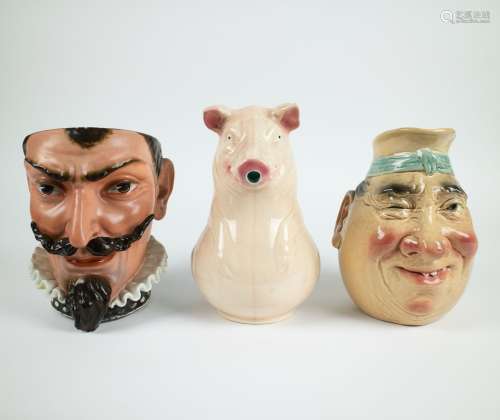 A collection of 3 decorative jugs in earthenware