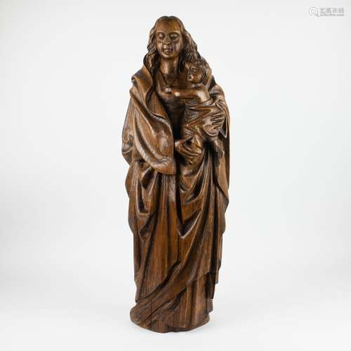 Wooden carved Madonna with child