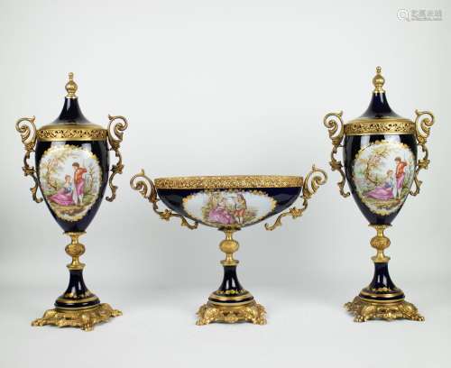 Sèvres garniture centre piece and a pair of covered vases