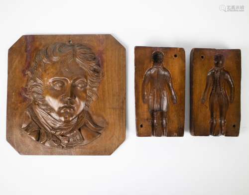 2 chocolate molds and wood carving Napoleon as a young offic...