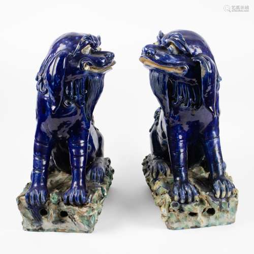 Couple Chinese Foo dogs in glazed ceramics