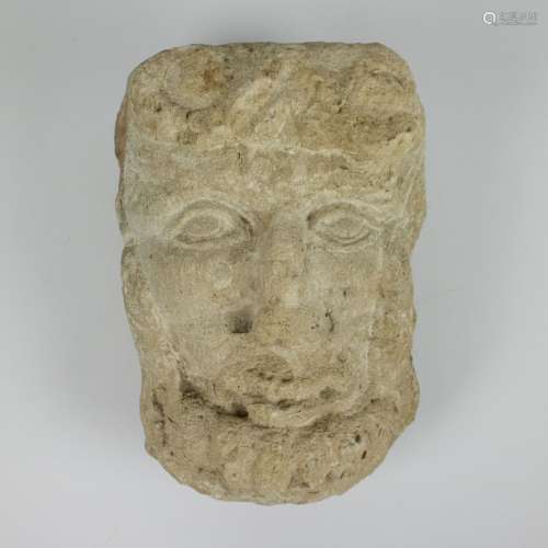 Man's head in limestone