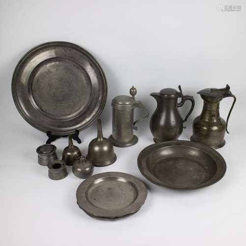 A collection of various tin items