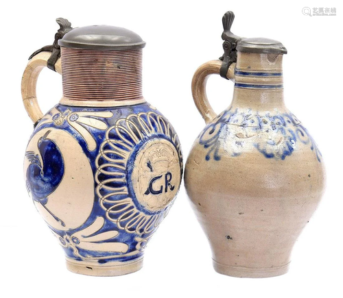 2 vitrified clay jugs