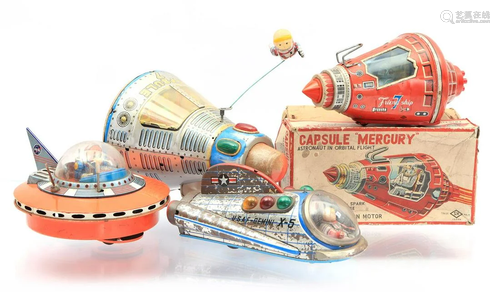 4 tin toy space vehicles