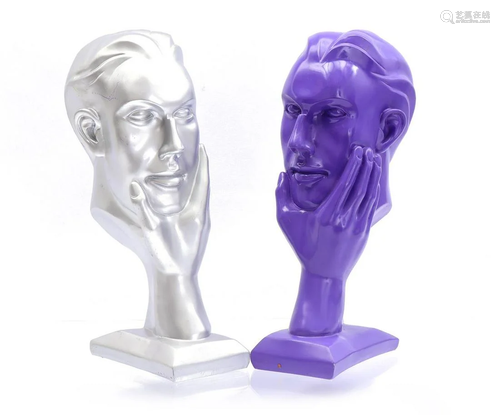 2 plastic purple and silver colored busts