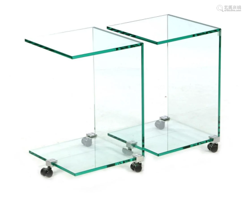2 glass mobile tables