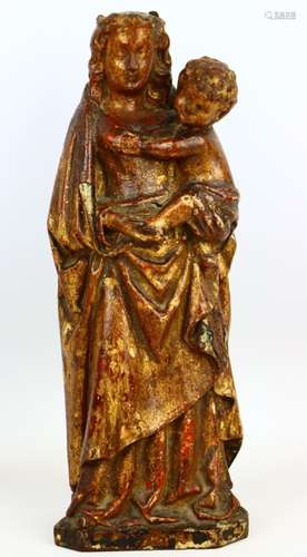 Vierge à l'enfant en bois sculpté et doré. Epoque XVIIIème s...