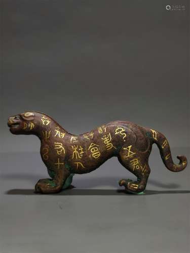 A WARRING STATES PERIOD GOLD INLAYING SILVER TIGER SHAPED TA...