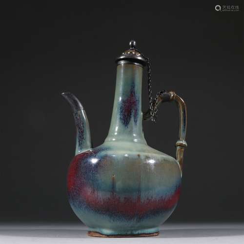 A YUAN DYNASTY JUN KILN HANDLED EWER POT