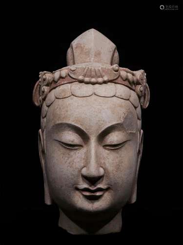 A NORTHERN QI DYNASTY BLUE STONE BUDDHA HEAD