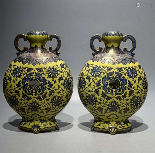 A PAIR OF QING DYNASTY YELLOW GROUND TANGLED LOTUS DOUBLE EA...