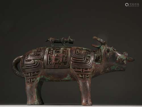 A WESTERN ZHOU DYNASTY RHINO SHAPED ZUN WITH LID