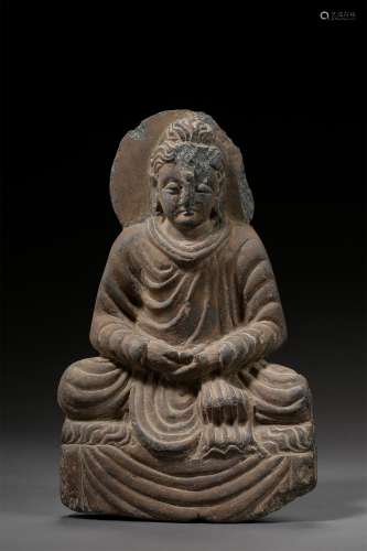 A GANDHARA GRAY SCHIST SITTING BUDDHA