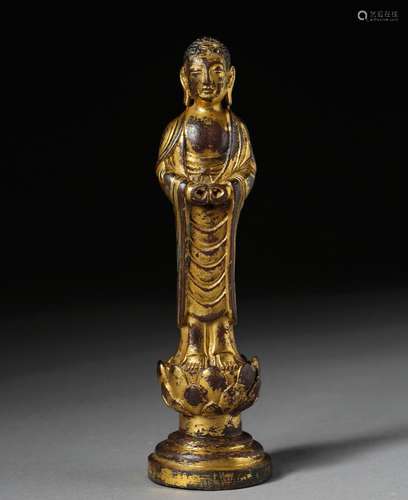 A LIAO DYNASTY BRONZE GILTING SAKYAMUNI BUDDHA STATUE