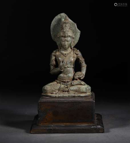 A YUAN DYNASTY BRONZE GUANYIN STATUE