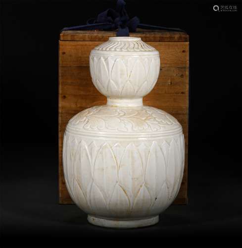 A SONG DYNASTY DING KILN GOURD BOTTLE