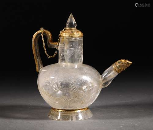 A LIAO DYNASTY CRYSTAL WRAPPED GOLD HANDLED EWER POT