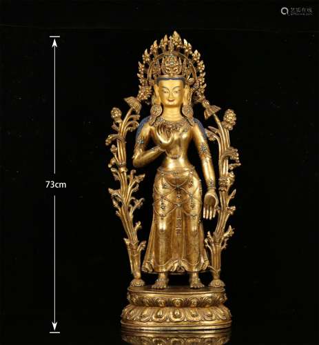 A MING DYNASTY BRONZE GILDED GUANYIN STATUE