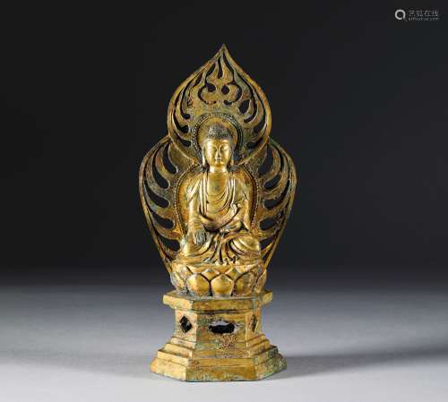 A TANG DYNASTY BRONZE GILDED BUDDHA STATUE