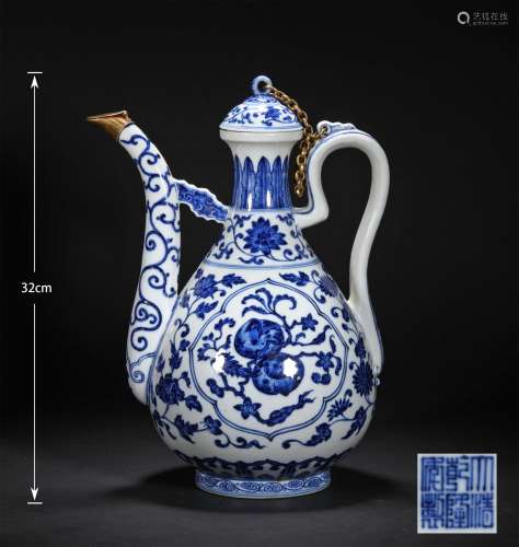 A QING DYNASTY BLUE AND WHITE WITH GOLD TANGLED LOTUS HANDLE...
