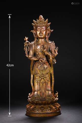 A MING DYNASTY BRONZE GILDED GUANYIN STATUE