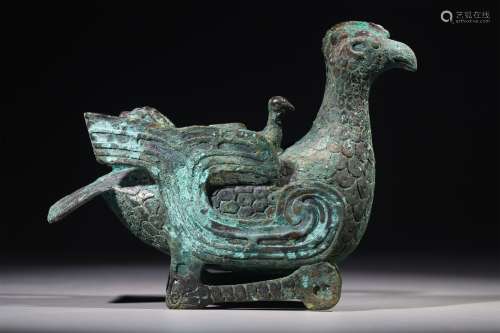 A WARRING STATES PERIOD BRONZE PHOENIX ORNAMENT