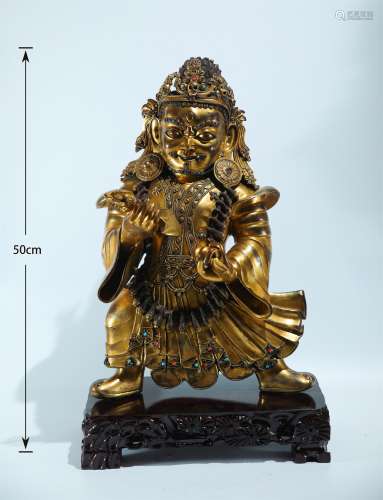 A MING DYNASTY BRONZE GILDING DHARMA STATUE
