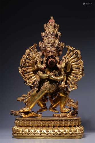 A MING DYNASTY BRONZE GILDED VAJRA STATUE