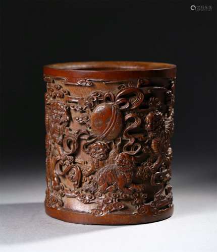 A QING DYNASTY BAMBOO CARVED BRUSH HOLDER